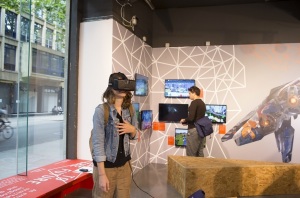 People using virtual reality headsets in an open space at the museum. This is allowing new insight to the exhibits and allowing the patrons to be involved with the art around them.